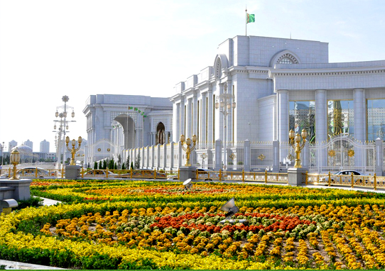 Modern architectural building in Ashgabat, Turkmenistan, representing the city's unique urban landscape.